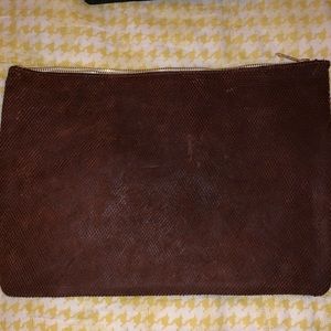 American Apparel brown leather clutch.